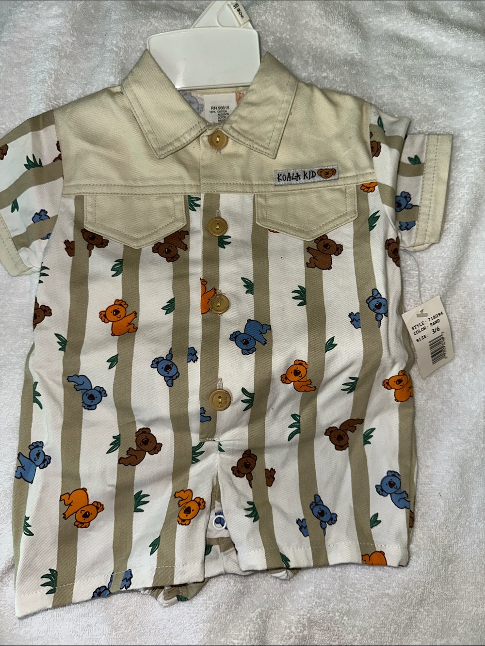 Koala Kids Beige, Blue & Orange Striped Koala Button-Front with snaps at leg.